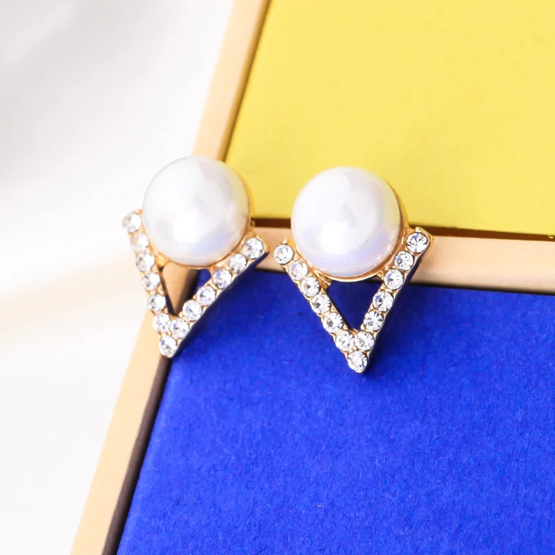 Sprzedaż hurtowa Z Fabryki 2020 Nowy Kreatywnych Kryształ Imitacja Pereł OL Biżuteria Eleganckie, Proste Modne Kolczyki w Kolorze Srebrnym