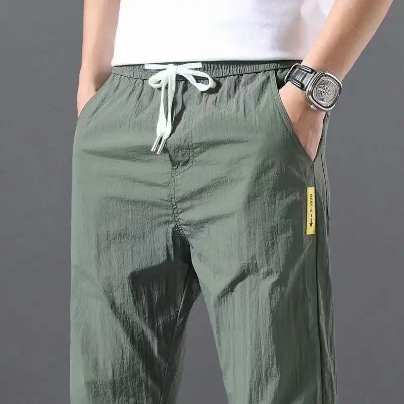 Letnie męskie casual spodnie z jedwabiu jedwab, letnia девятиточечная koreańska wersja trendów sportowych spodni